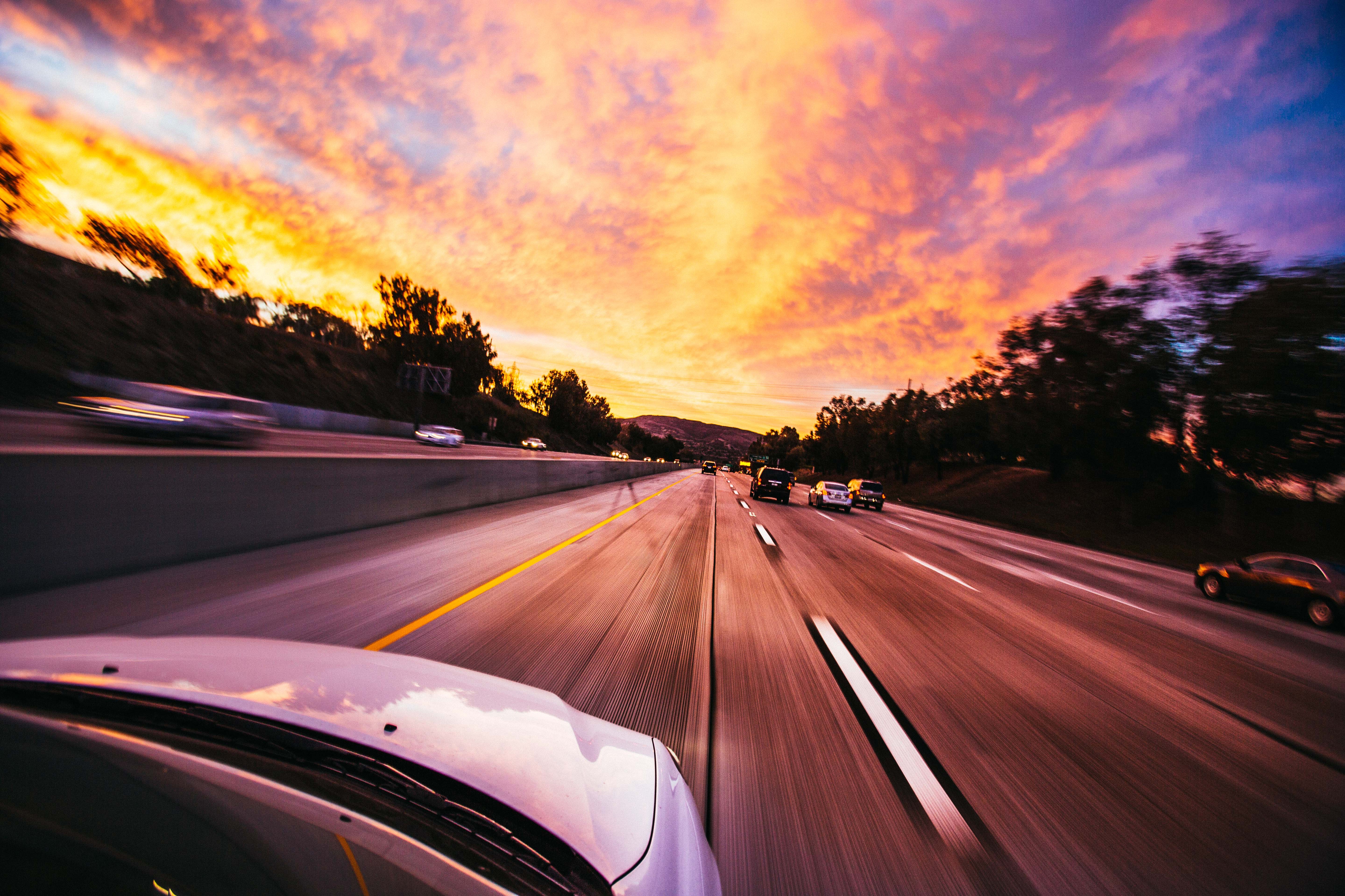 Image of sunset while driving