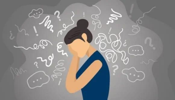 A woman with her head in her hands, surrounded by question marks, exclamation points and scribbled lines, depicting stress and overwhelm