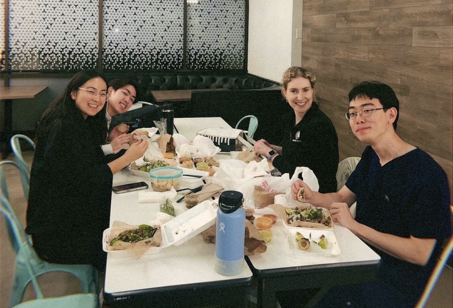 photo of students eating a meal together
