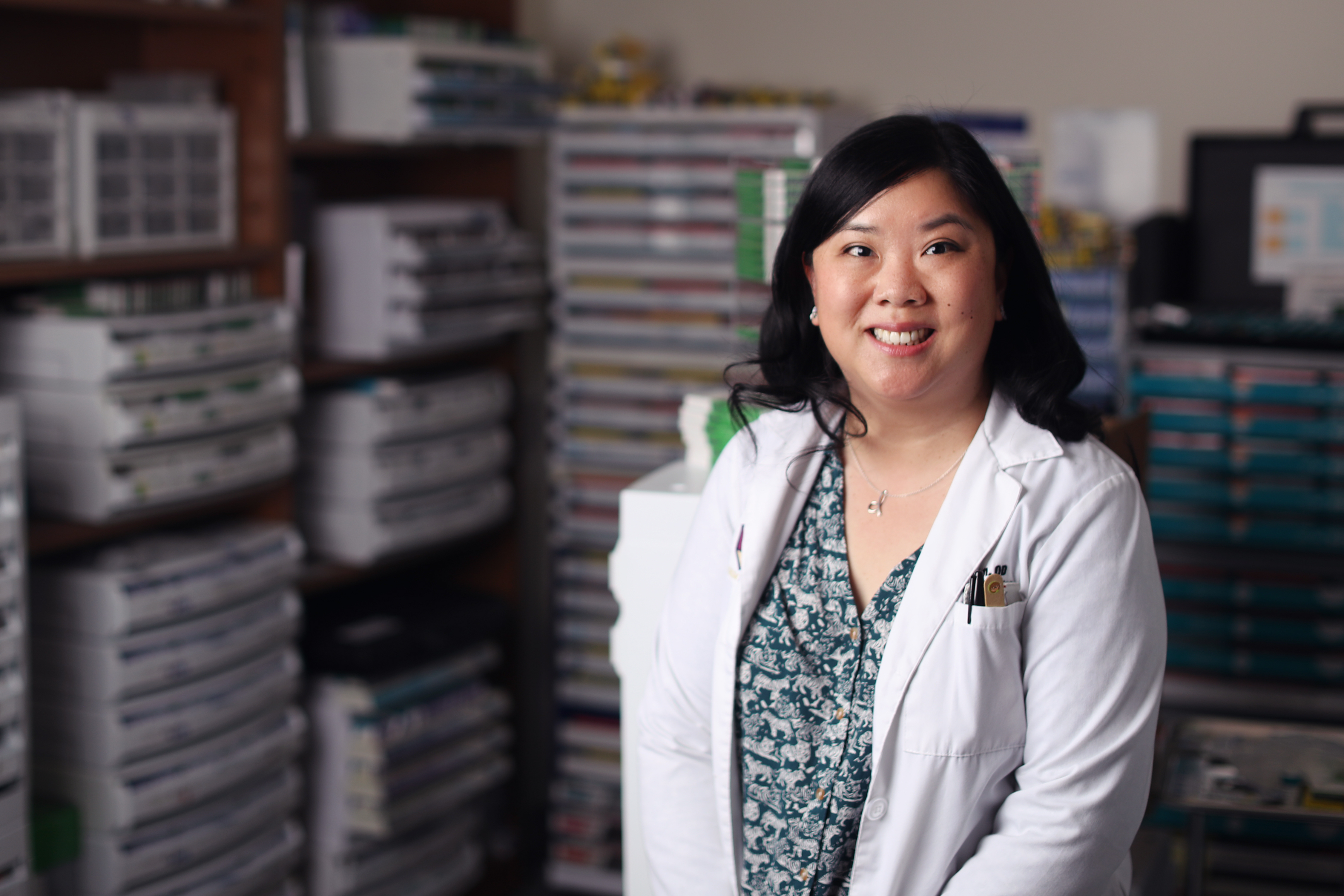 Dr. Dawn Lam poses inside the Contact Lens lab