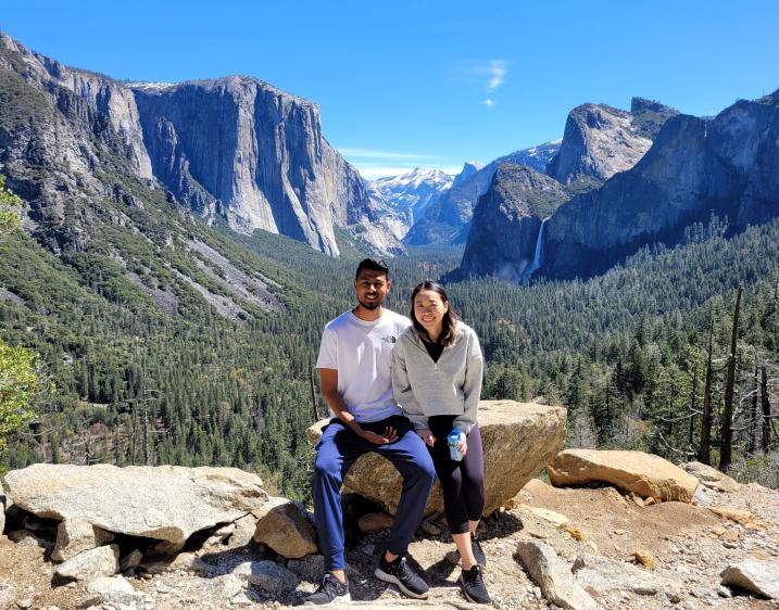 Photo of student with mountains in the background