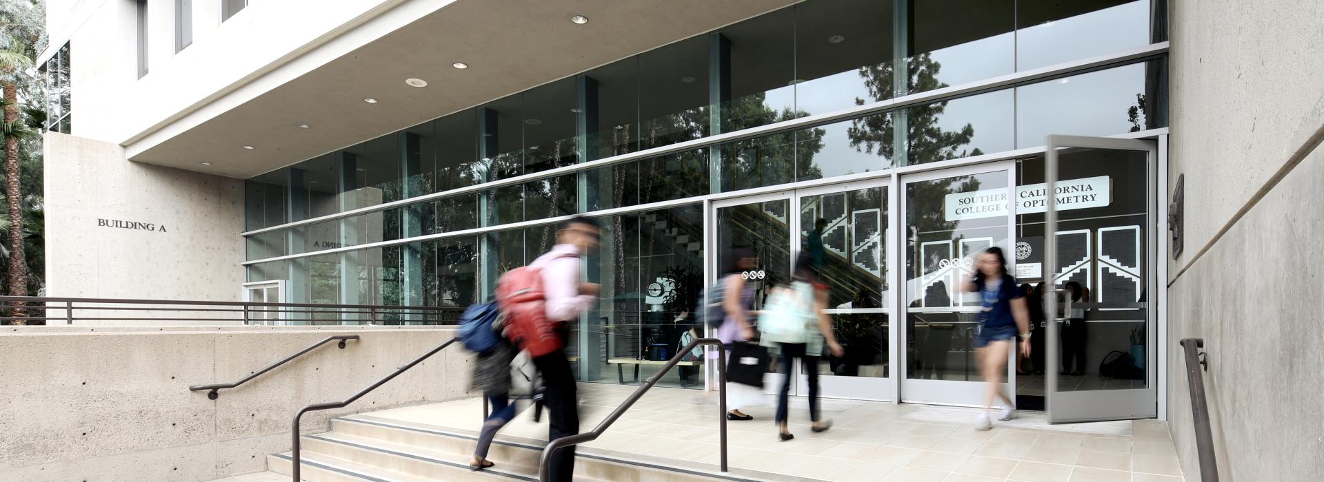 Group of students walking to library and lecture