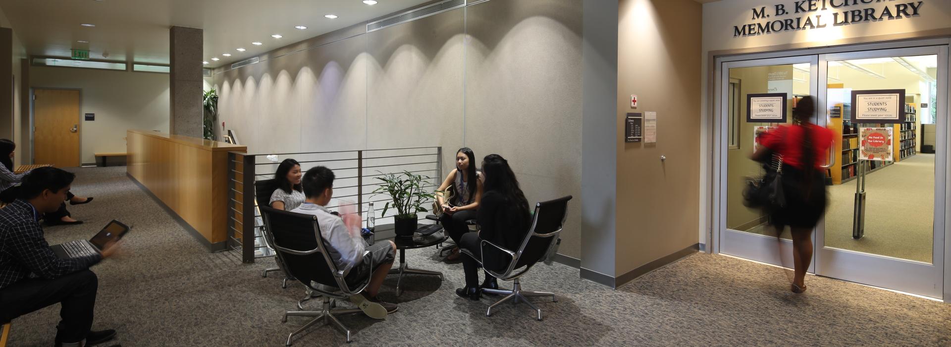 Students sitting outside of the MB Ketchum Memorial Library