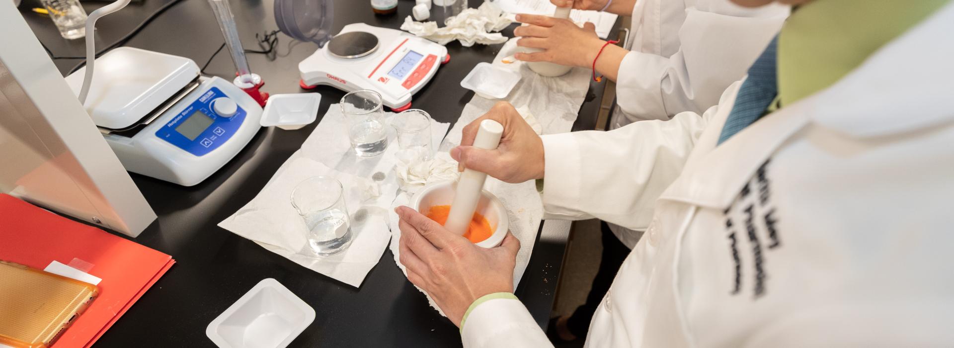 Student during a pharmacy compound lab