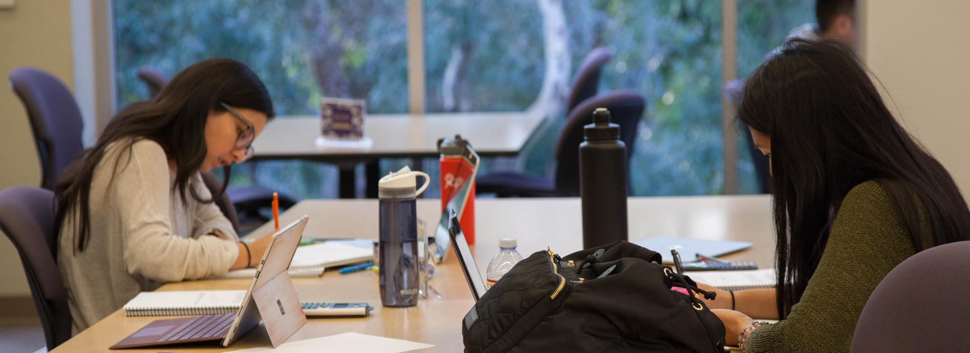 MBKU students  studying in the library