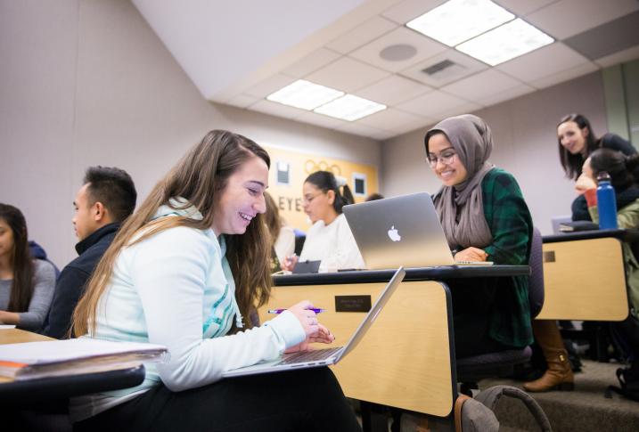 students discussing in a classroom