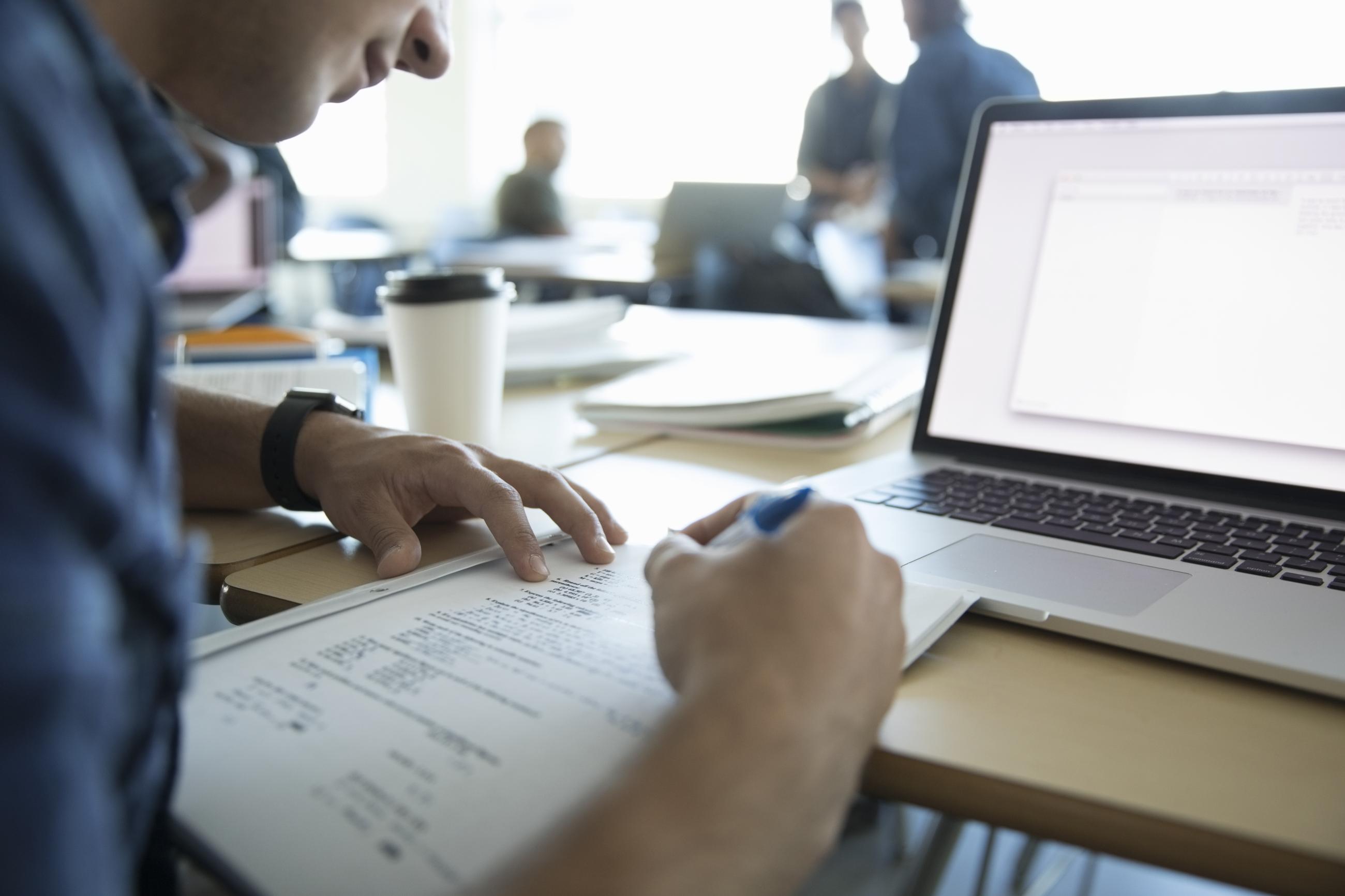 Doctor going through online continuing education coursework